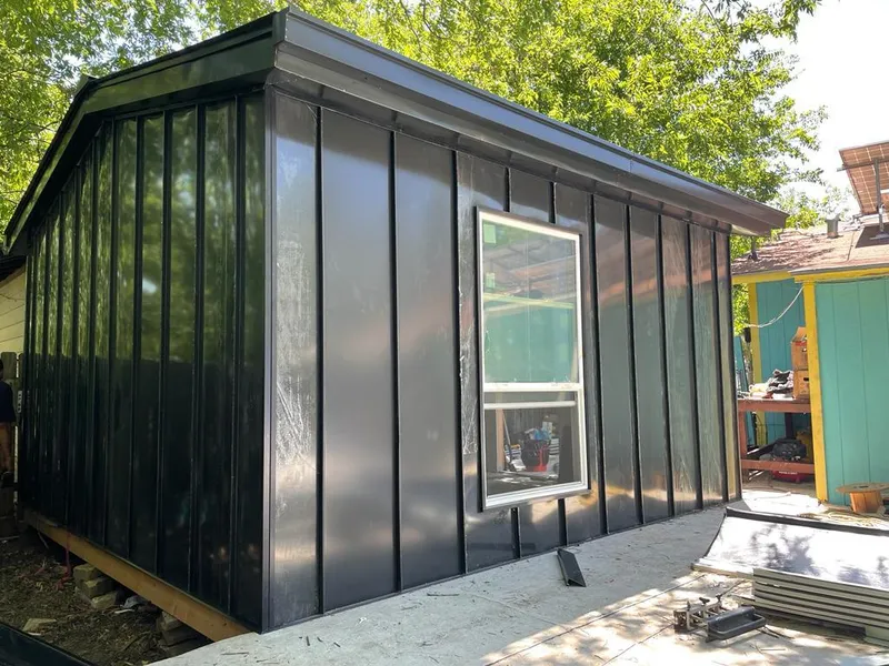 Black standing seam metal wall panels for Metal Roof Installation in South Park